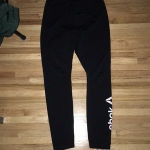 Black athletic Reebok legging
